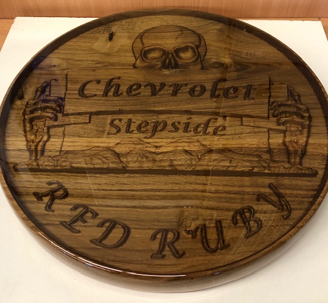 A carved table top made with ENTROPY RESINS epoxy