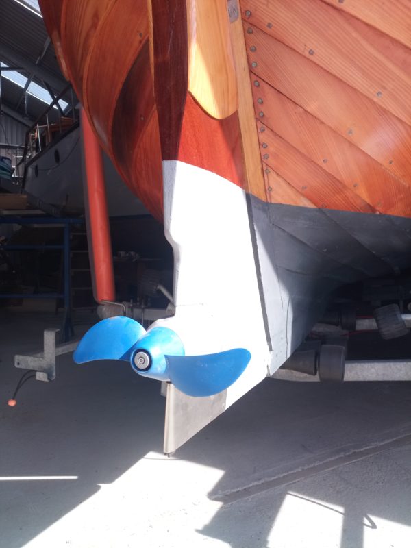 Scottish boatbuilder using WEST SYSTEM® epoxy to embed electric propulsion into traditional rudders