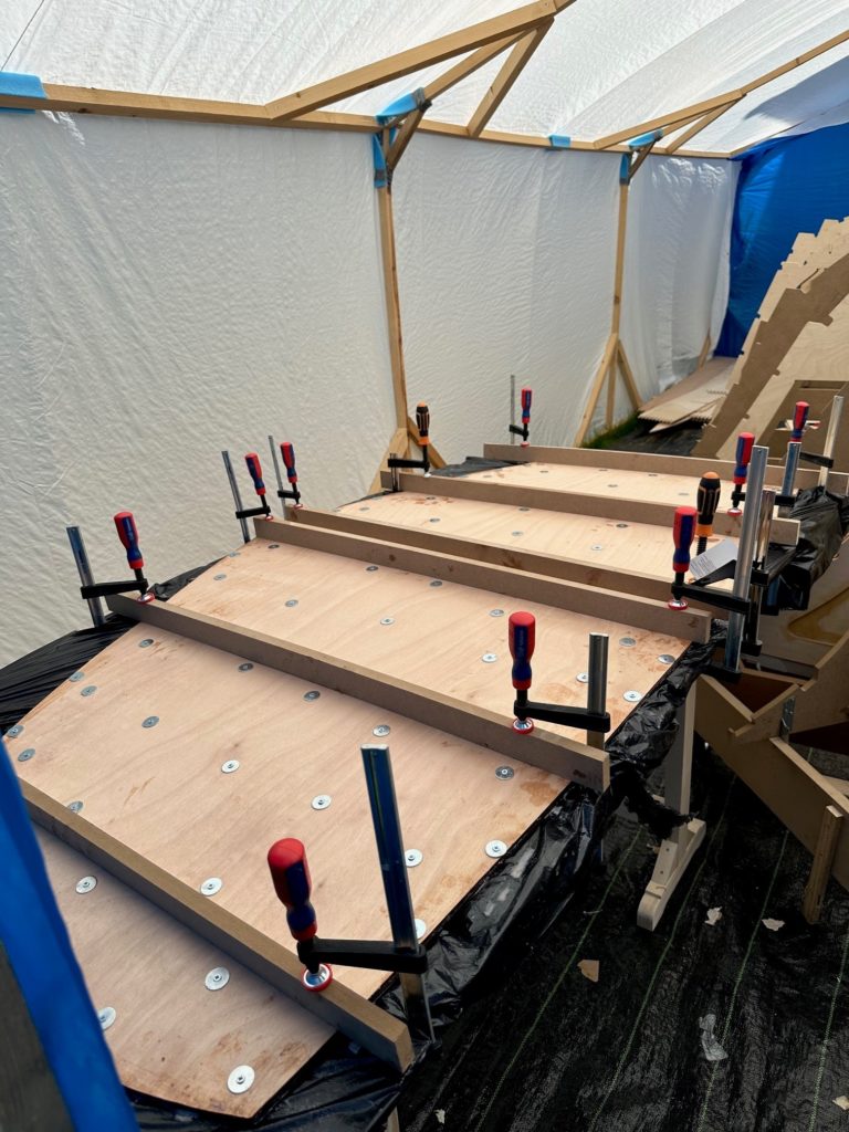Clamps holding the west system epoxy
