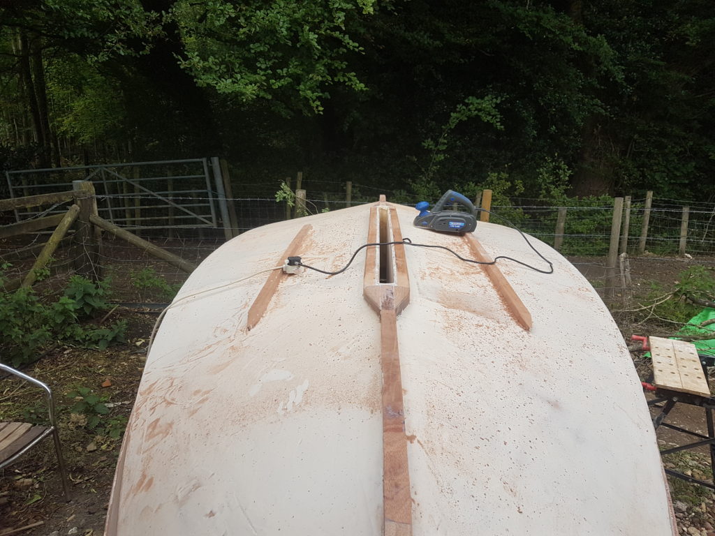 Fairing the hull on the swallow yachts boat