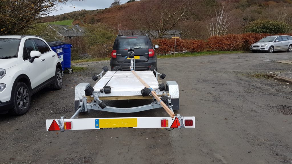 The trailer ready for swallow yachts boat design using west system epoxy in the build