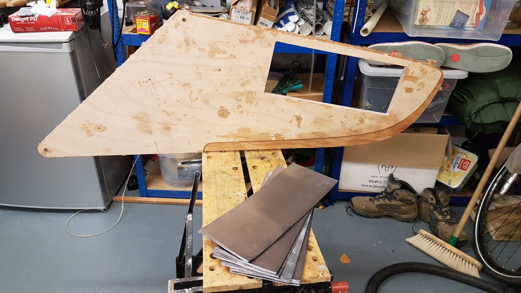 The swallow yachts flat pack cut up into pieces covered in west system epoxy