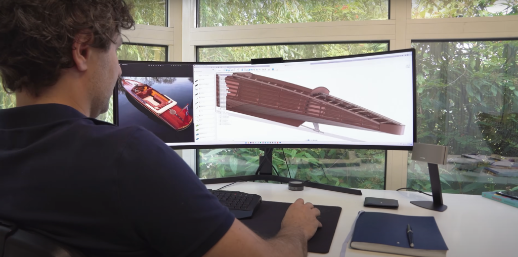 man working on his project on the computer