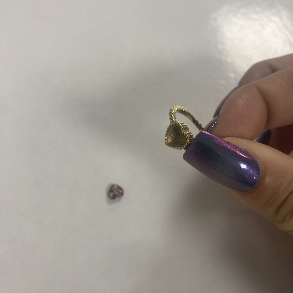 Removing the dust from the ring using solvent
