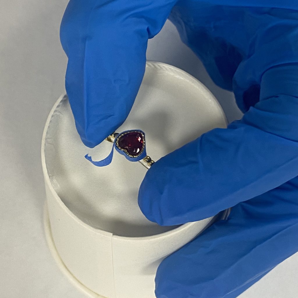Adding the gem once the west system g/flex epoxy has been added
