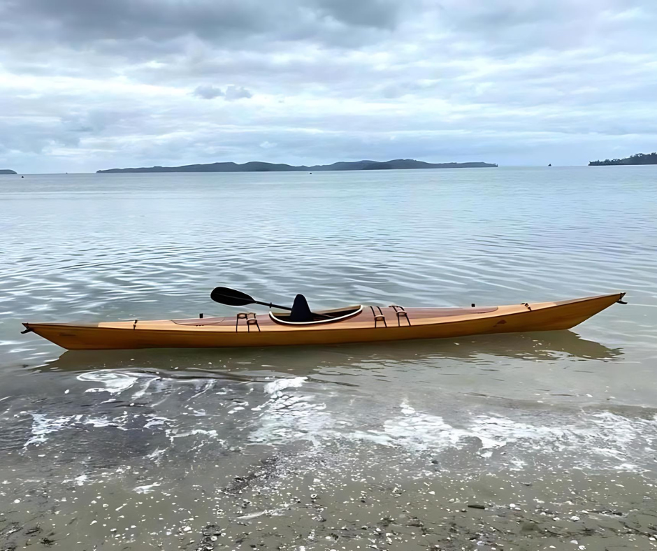 Wood Kayak in NZ waters by Stan Orme built using Entropy Resins Epoxy.