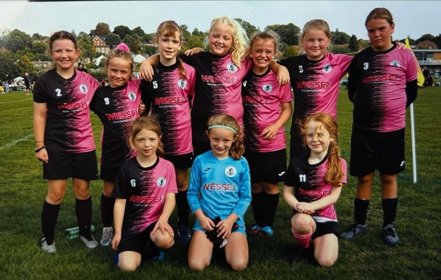 Girls football team showing the Wessex Resins & Adhesives as the main shirt logo