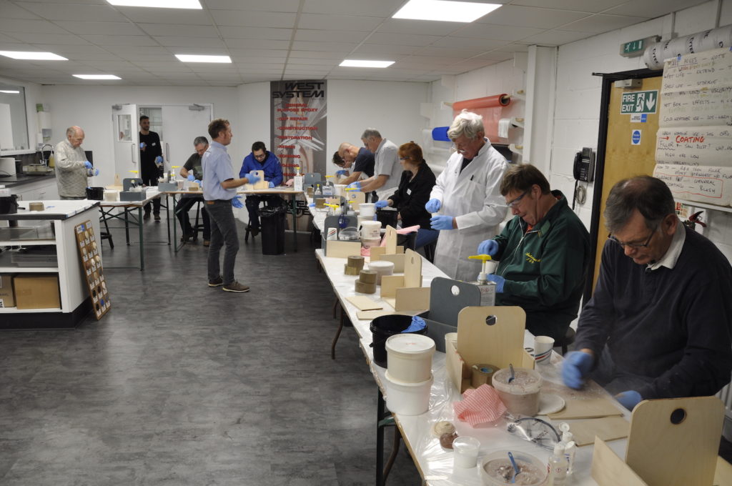 Group of people making wooden tool boxes at a Wessex Resins WEST SYSTEM workshop