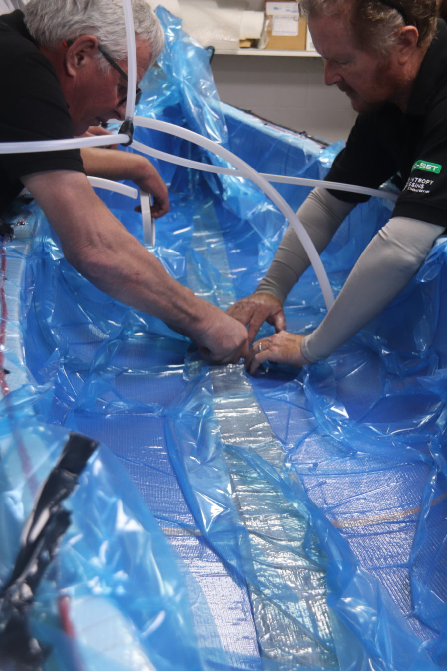 Demonstrating vacuum sealing a boat