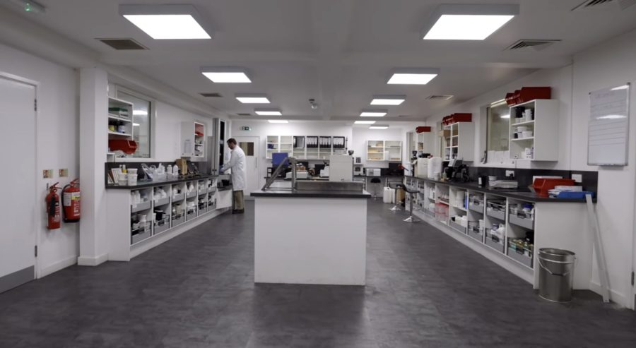 The Wessex Resins laboratory showing multiple counters and scientific machinery, a scientist works in the background